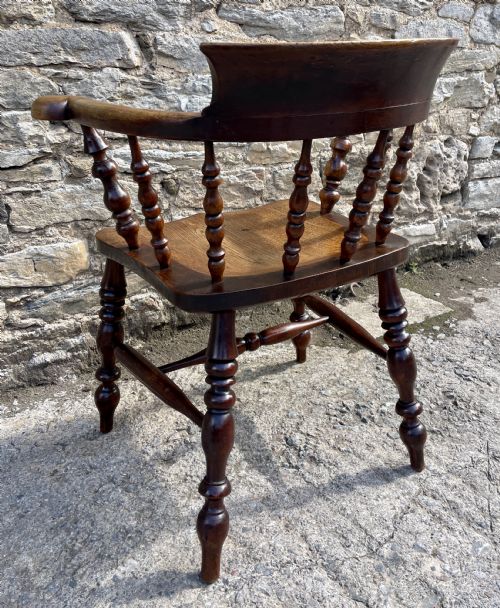 fig 2. Antique Elm Captains Chair