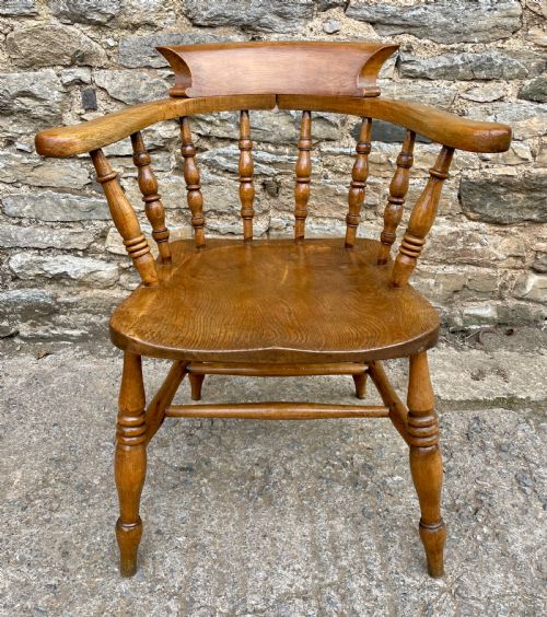 fig 1. Antique Elm Captains Chair