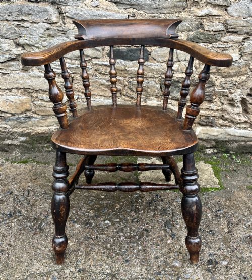 fig 1. Antique Elm Captains Chair