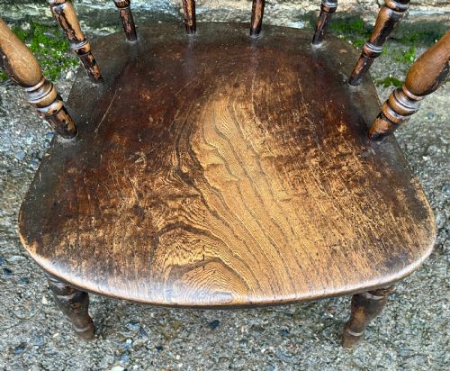 fig 1. Antique Elm Captains Chair