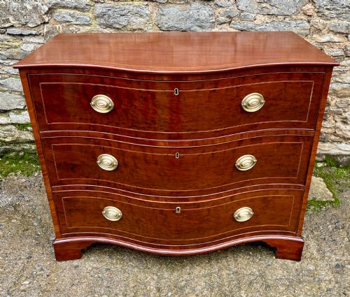 fig 1. George III Serpentine Mahogany Chest of Drawers