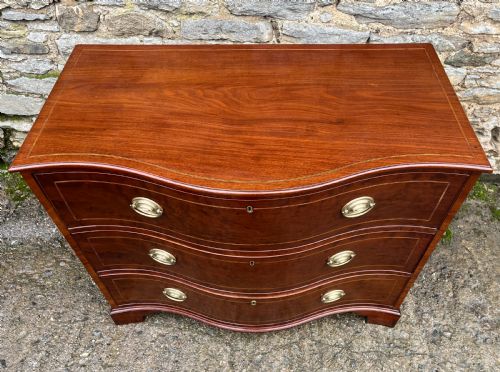 fig 2. George III Serpentine Mahogany Chest of Drawers