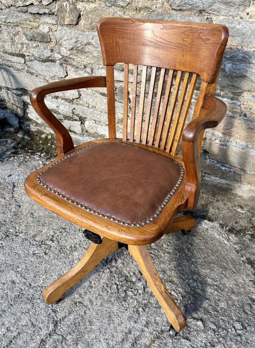 fig 1. Antique Oak Swivel and Tilt Desk Chair