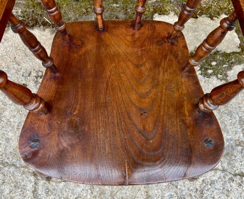 fig 2. Antique Elm Captains Chair