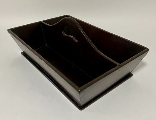 fig 1. An antique Georgian dark mahogany wooden cutlery tray featuring a central division with a carved carrying handle.