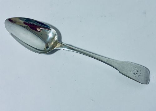 fig 1. An antique Exeter sterling silver tablespoon featuring a classic fiddle pattern handle with an engraved monogram.