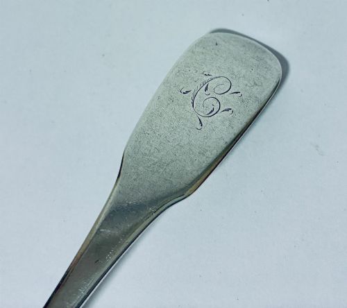 fig 2. An antique Exeter sterling silver tablespoon featuring a classic fiddle pattern handle with an engraved monogram.