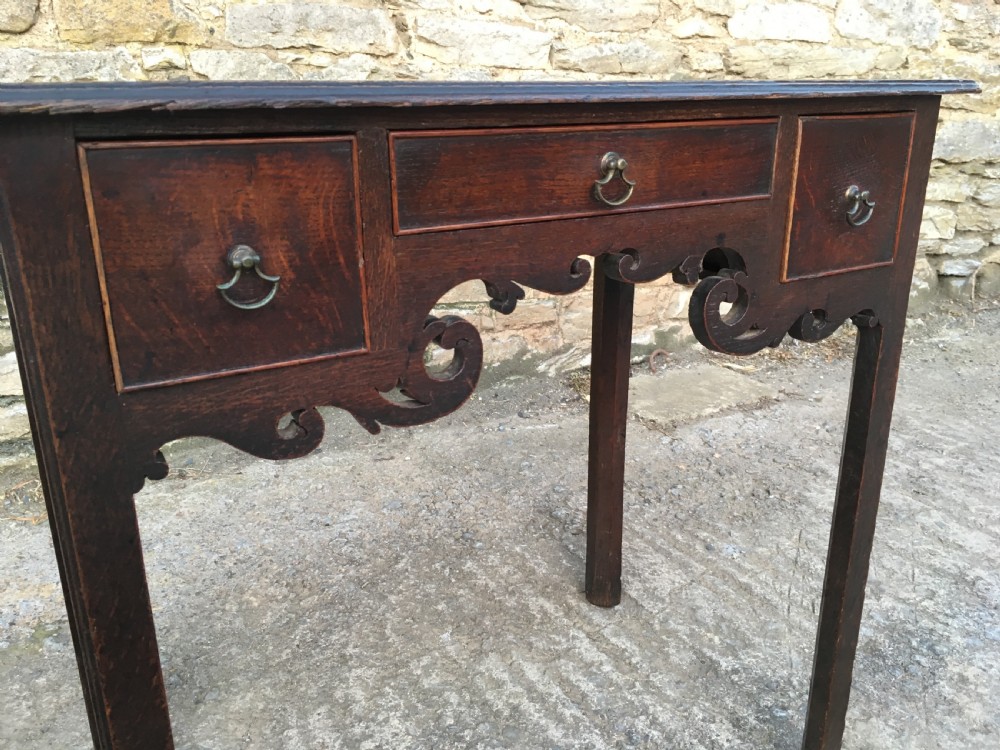 Antique 18th Century Oak Lowboy with Fretwork Frieze View X