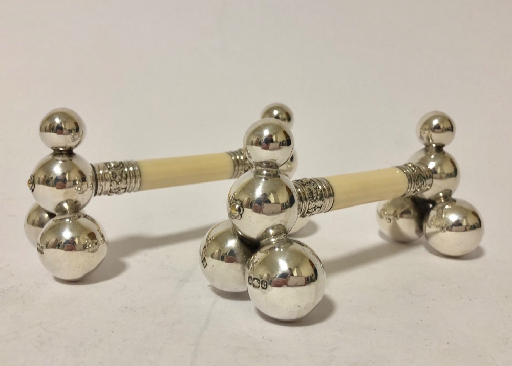 Pair of Antique Silver and Ivory Knife Rests