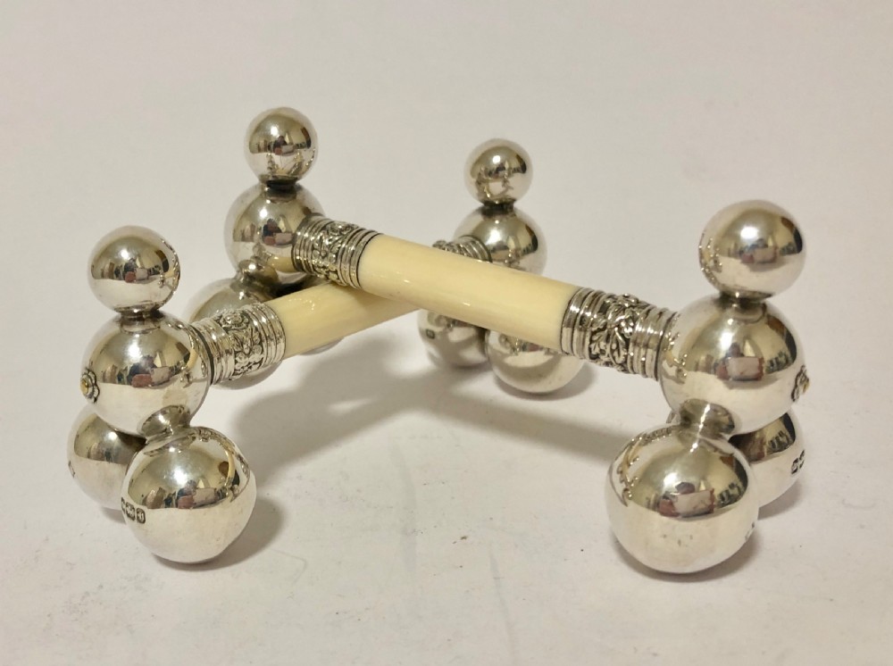 Pair of Antique Silver and Ivory Knife Rests View VII