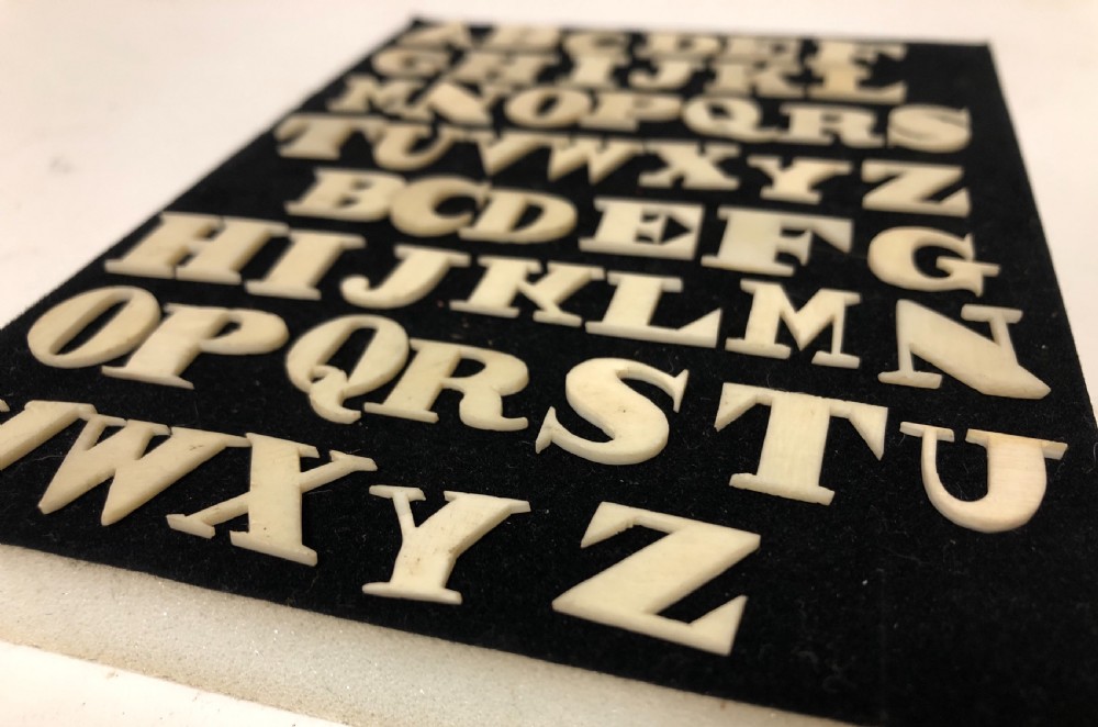 Set of Antique Bone Spelling Alphabet Letters View IV
