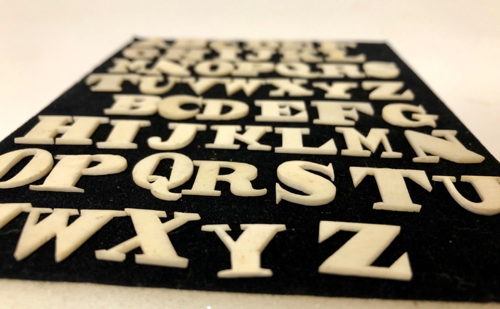 Set of Antique Bone Spelling Alphabet Letters View V