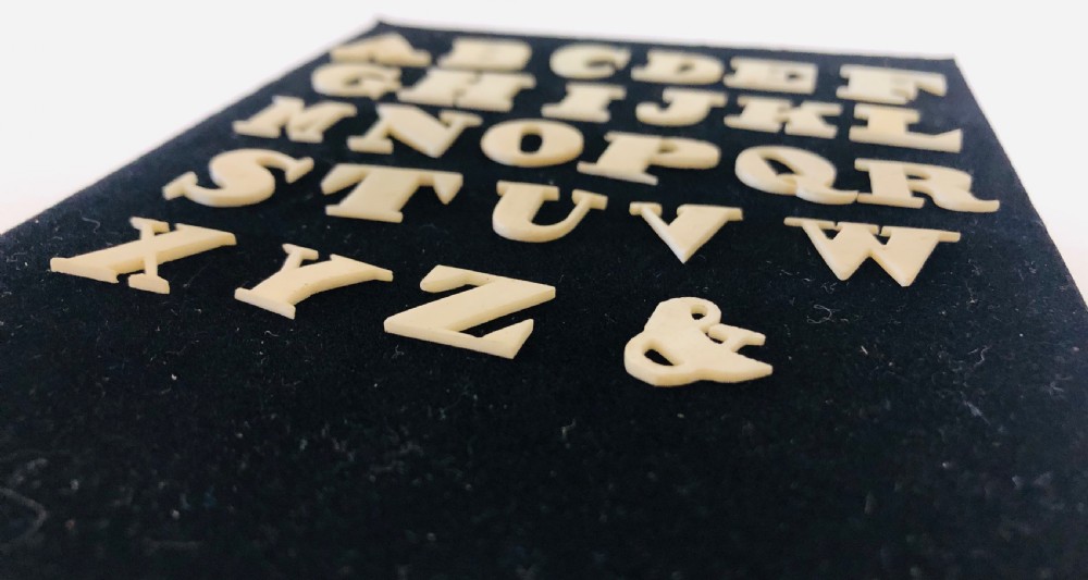 Antique Bone Spelling Alphabet Letters View III