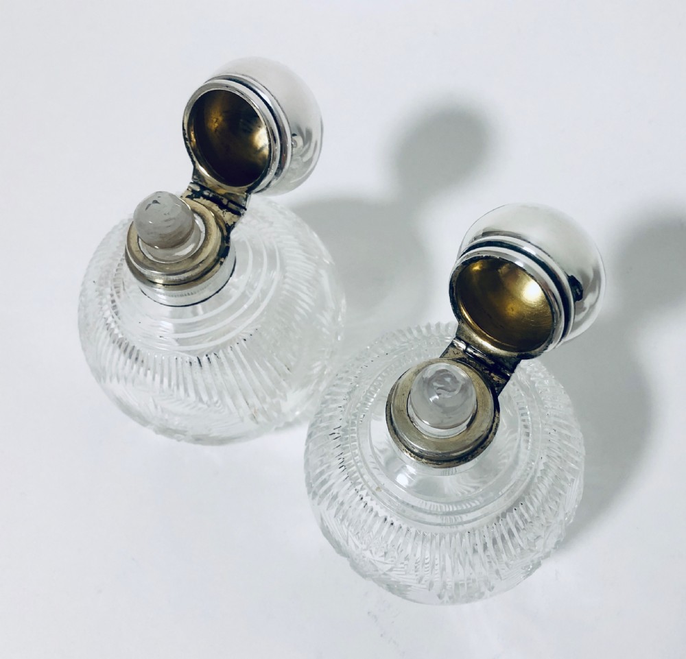 Pair of Antique Cut Glass Scent Bottles with Silver Tops View VI