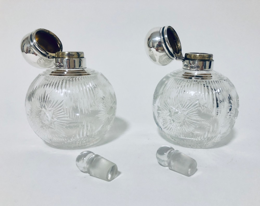 Pair of Antique Cut Glass Scent Bottles with Silver Tops View VIII