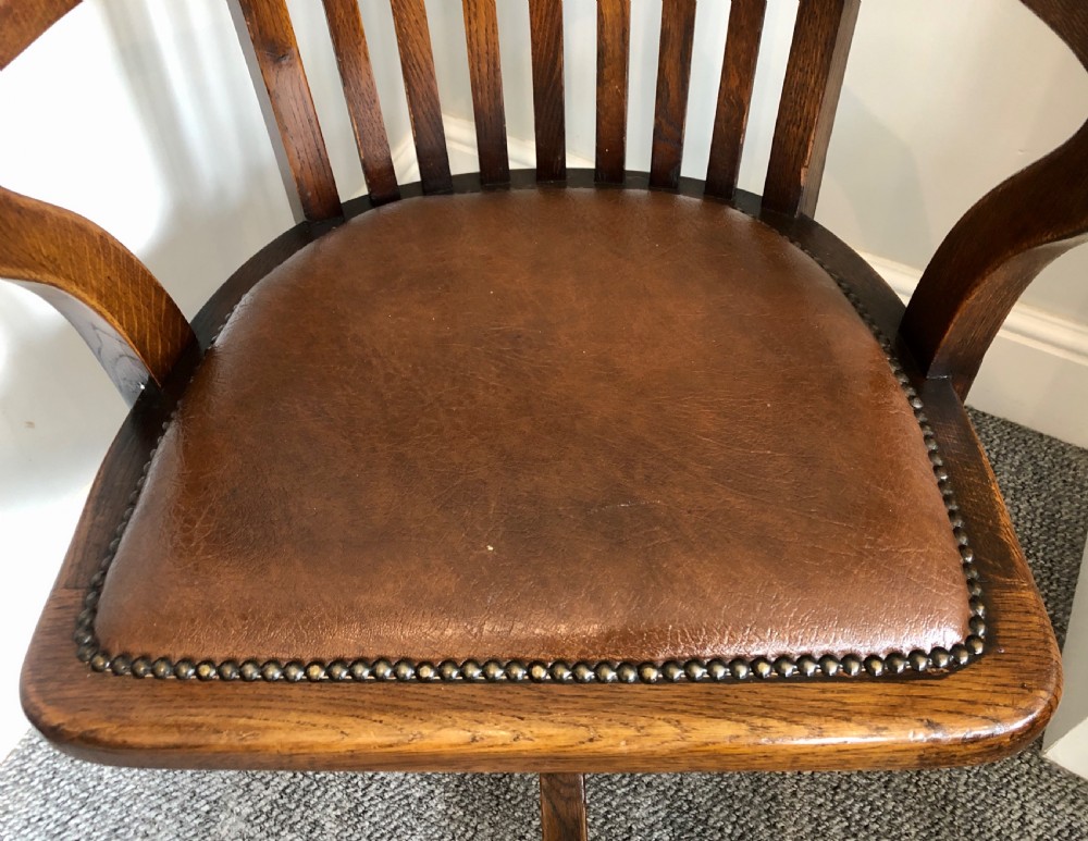 Antique Swivel and Tilt Oak Desk Chair View IX