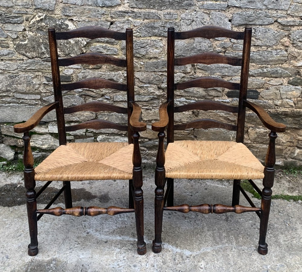 Pair of Rush Seat Ladderback Carver Chairs