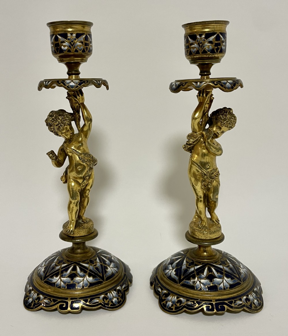 Pair of Antique Gilt and Enamel Putti Candlesticks
