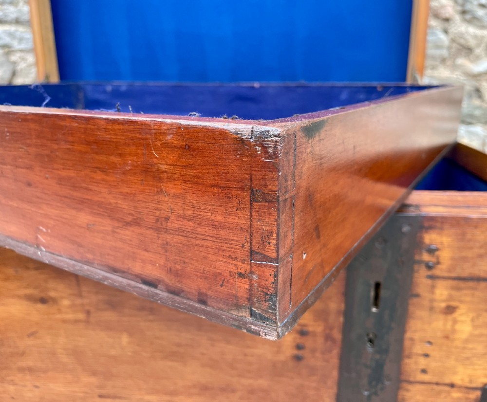 A large Victorian warm brown oak silver chest featuring dark iron straps, corner brackets, and a central keyhole. View XIII