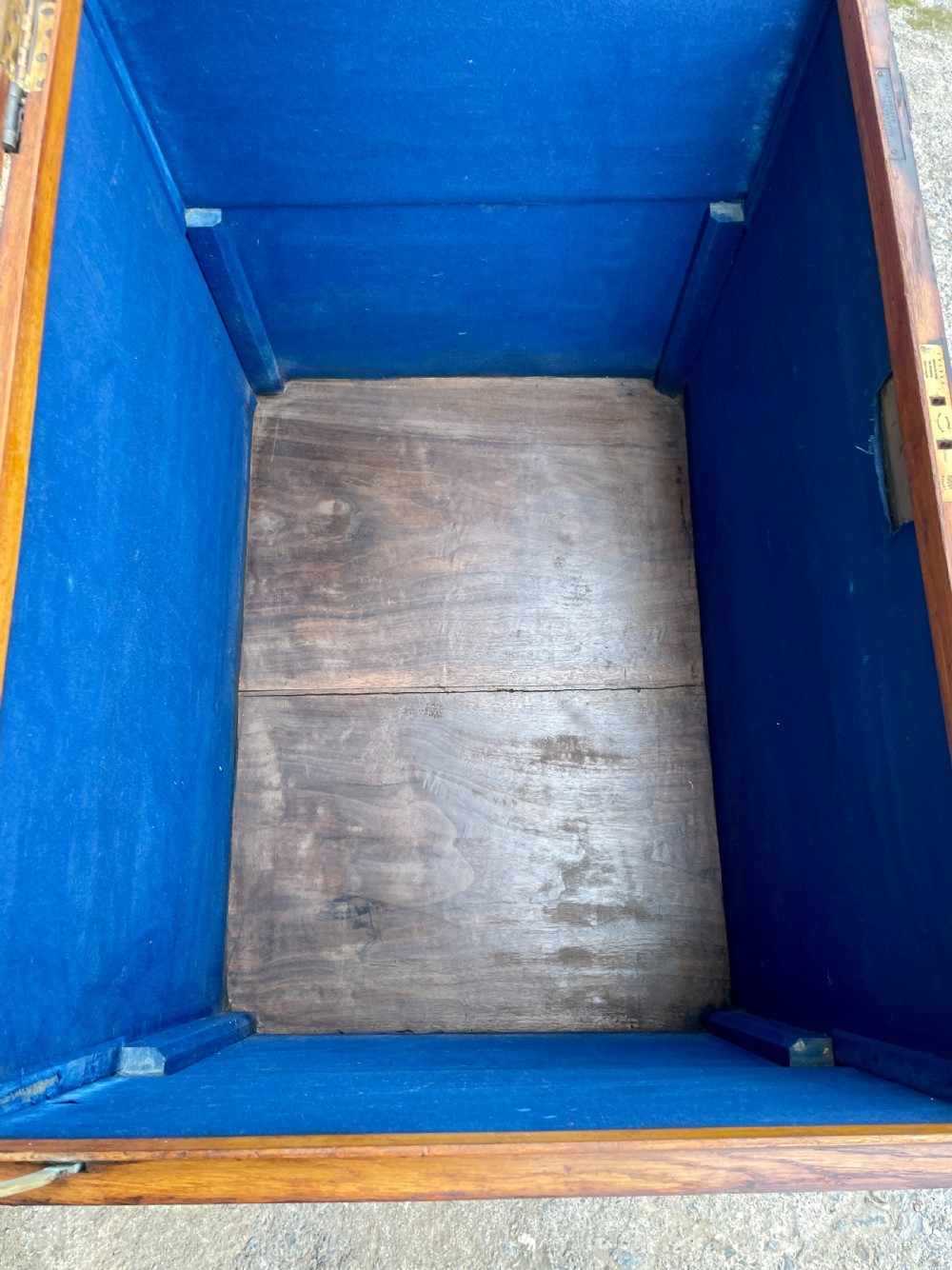 A large Victorian warm brown oak silver chest featuring dark iron straps, corner brackets, and a central keyhole. View XXII