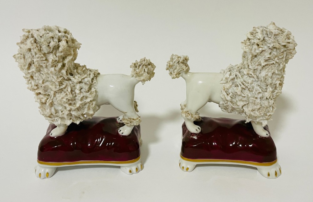 Pair of Antique Pottery Poodles View II