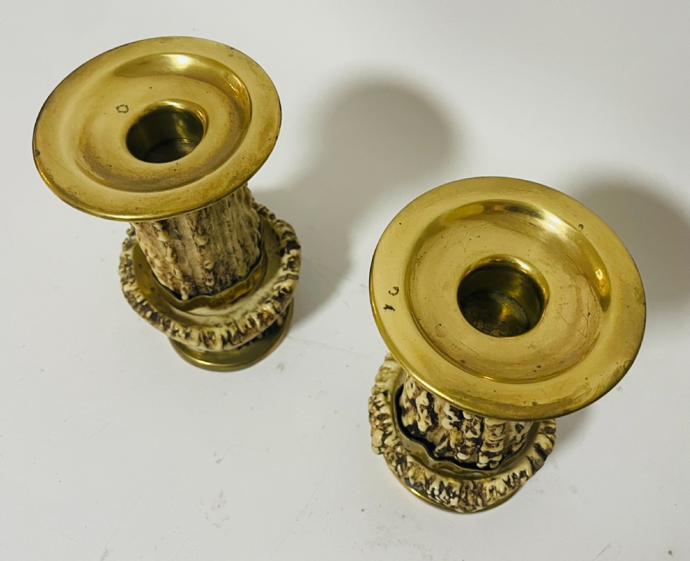 A Victorian desk set featuring a cut-glass inkwell in a brass frame, a brass letter opener with an antler handle, two small antler candlesticks, and a central brass-handled antler object. View XI