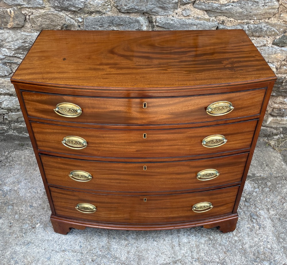Small Georgian Mahogany and Ebony Bow Front Chest of Drawers View II