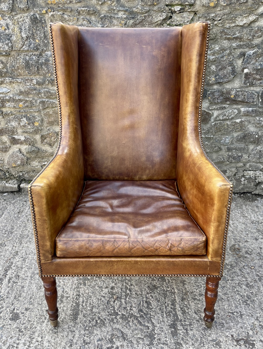 Antique Leather Wingback Armchair View II