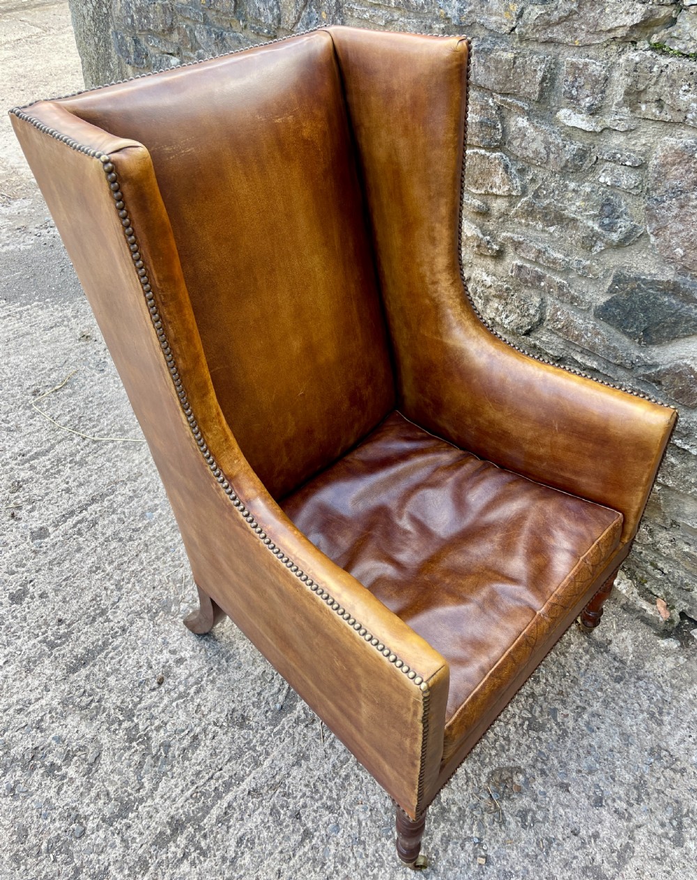 Antique Leather Wingback Armchair View VIII