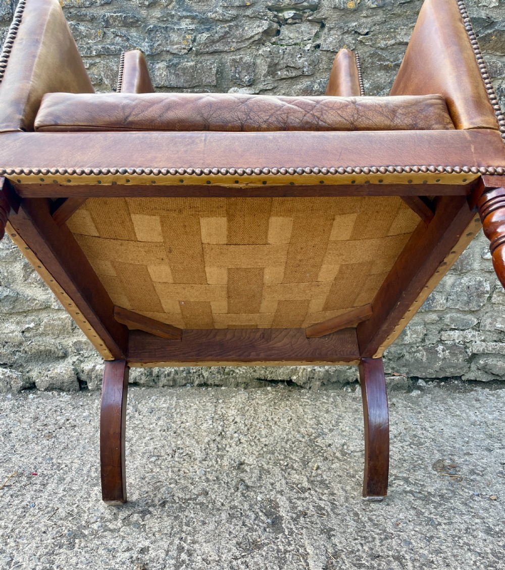 Antique Leather Wingback Armchair View XVI