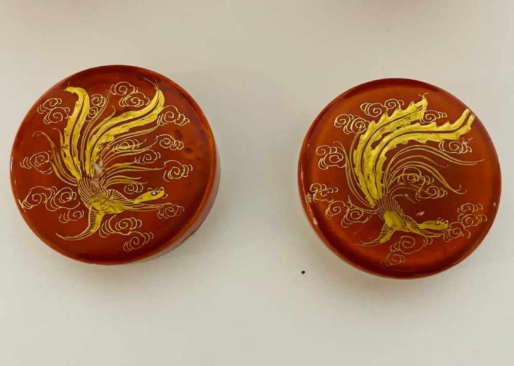 A pair of Japanese Kutani porcelain ginger jars decorated with iron-red hand-painted figures of children playing beneath decorative cloud and leaf borders. View XII