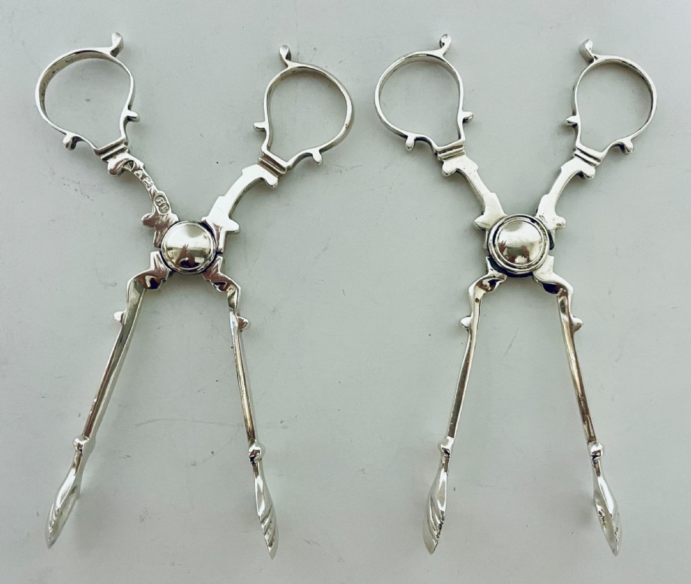 Pair of Victorian Silver Sugar Nips View VIII
