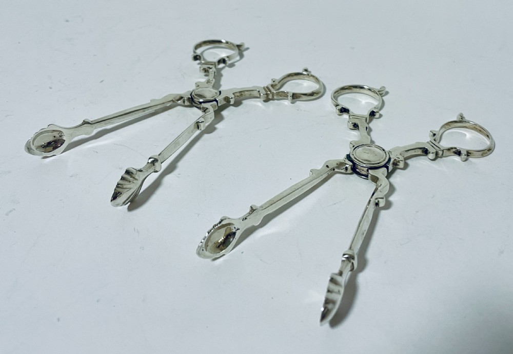 Pair of Victorian Silver Sugar Nips View IX