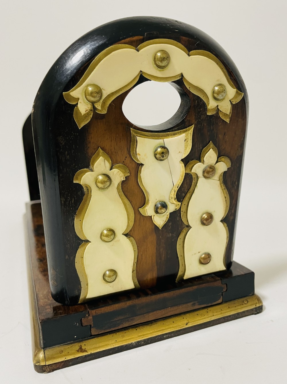 An antique Victorian coromandel wood expanding book slide featuring brass trim and decorative bone mounts pinned with studs. View XI
