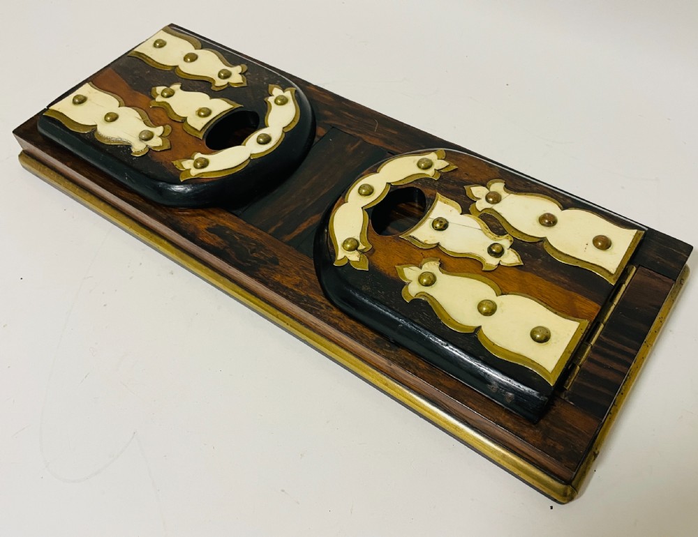 An antique Victorian coromandel wood expanding book slide featuring brass trim and decorative bone mounts pinned with studs. View XV