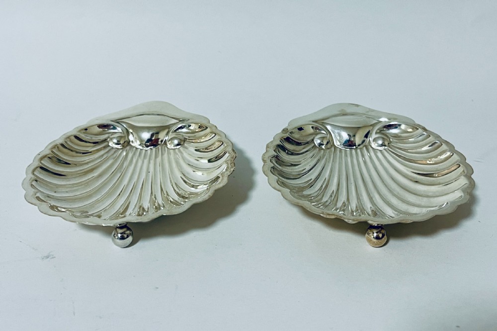 Pair of Antique Silver Shell Shaped Butter Dishes