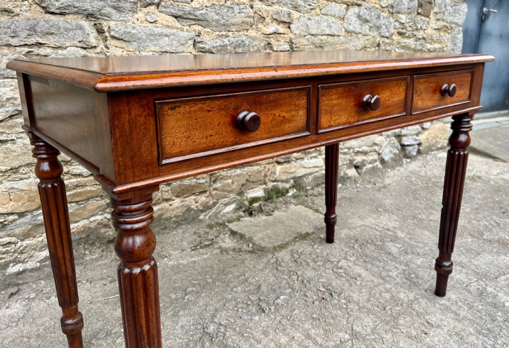Regency Mahogany Three Drawer Writing Table View X