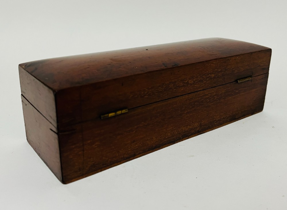 A Victorian brass drum microscope seated in its original fitted mahogany box with brass clasps. View IX