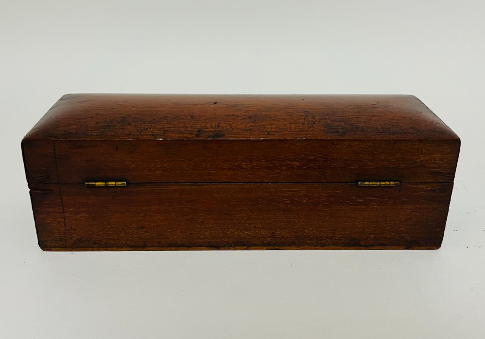 A Victorian brass drum microscope seated in its original fitted mahogany box with brass clasps. View XI