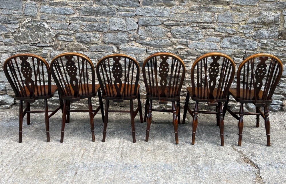 Harlequin Set of 6 Antique Wheelback Chairs View VII