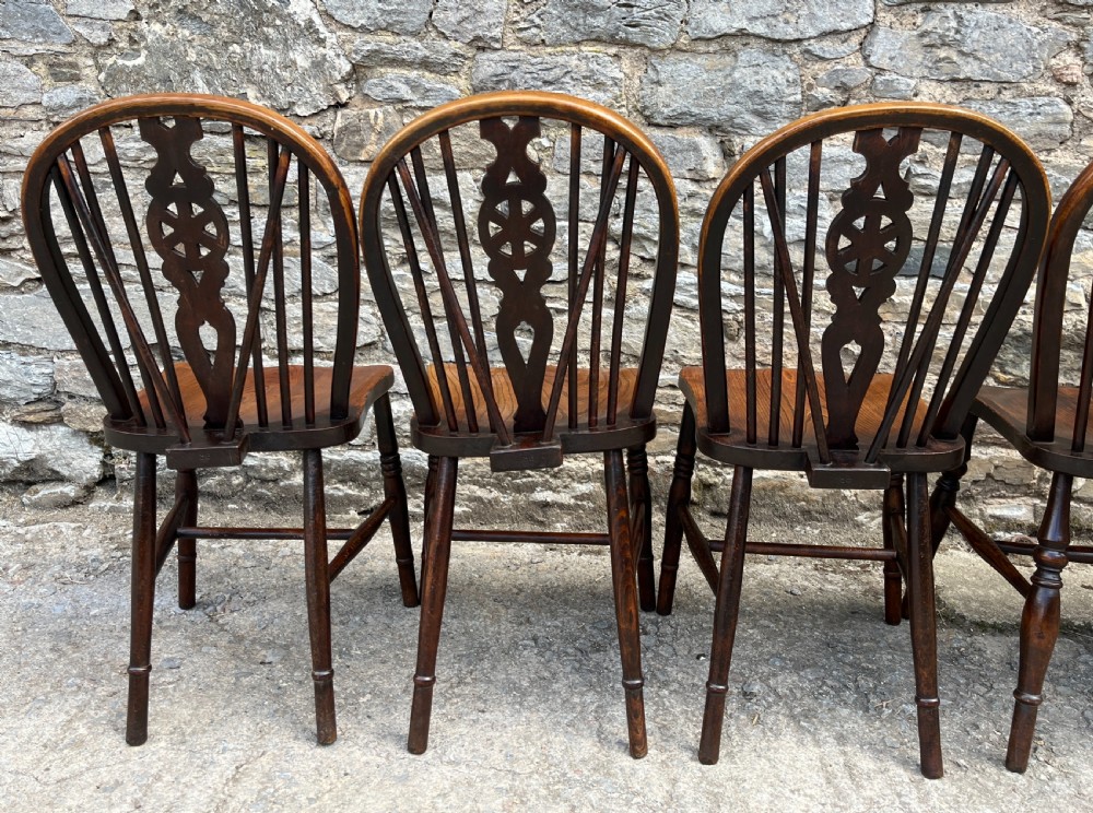 Harlequin Set of 6 Antique Wheelback Chairs View VIII