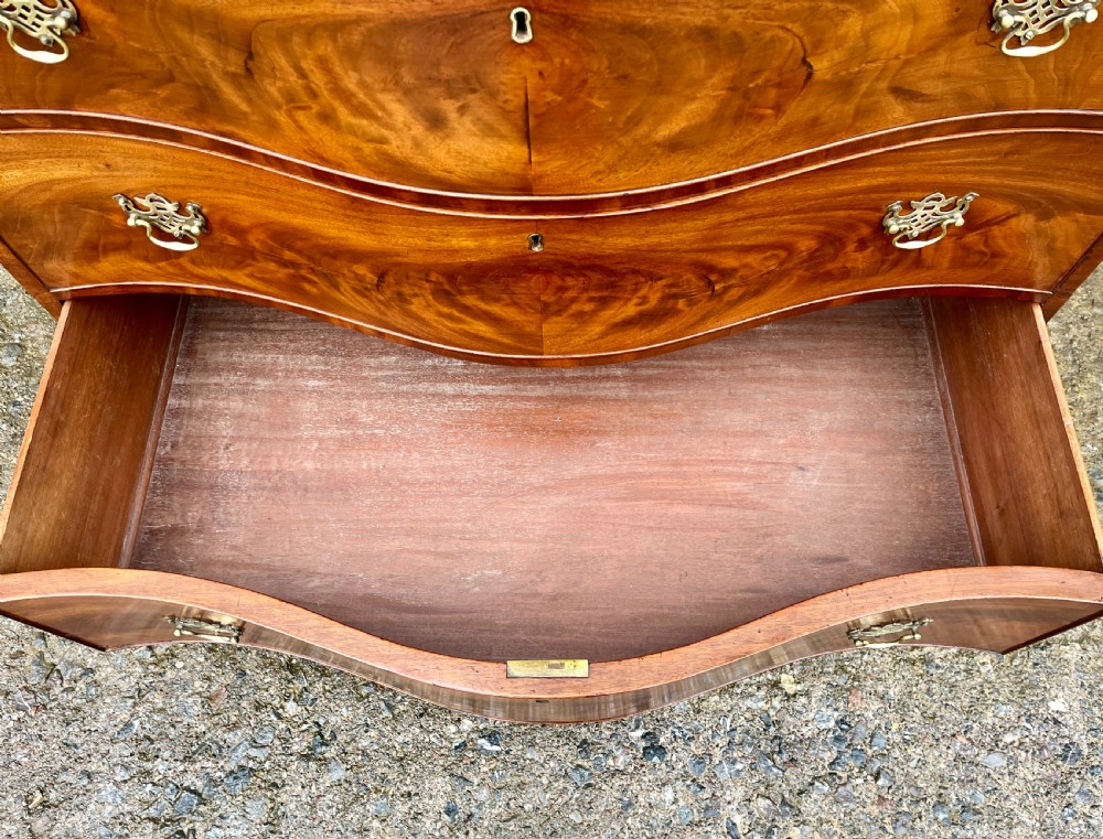 George III Serpentine Mahogany Chest of Drawers View IV