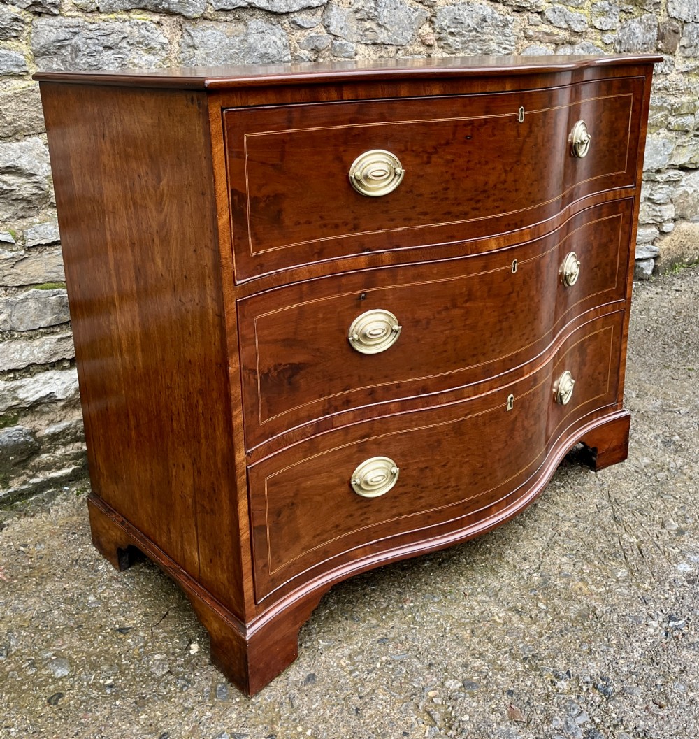 George III Serpentine Mahogany Chest of Drawers View IV