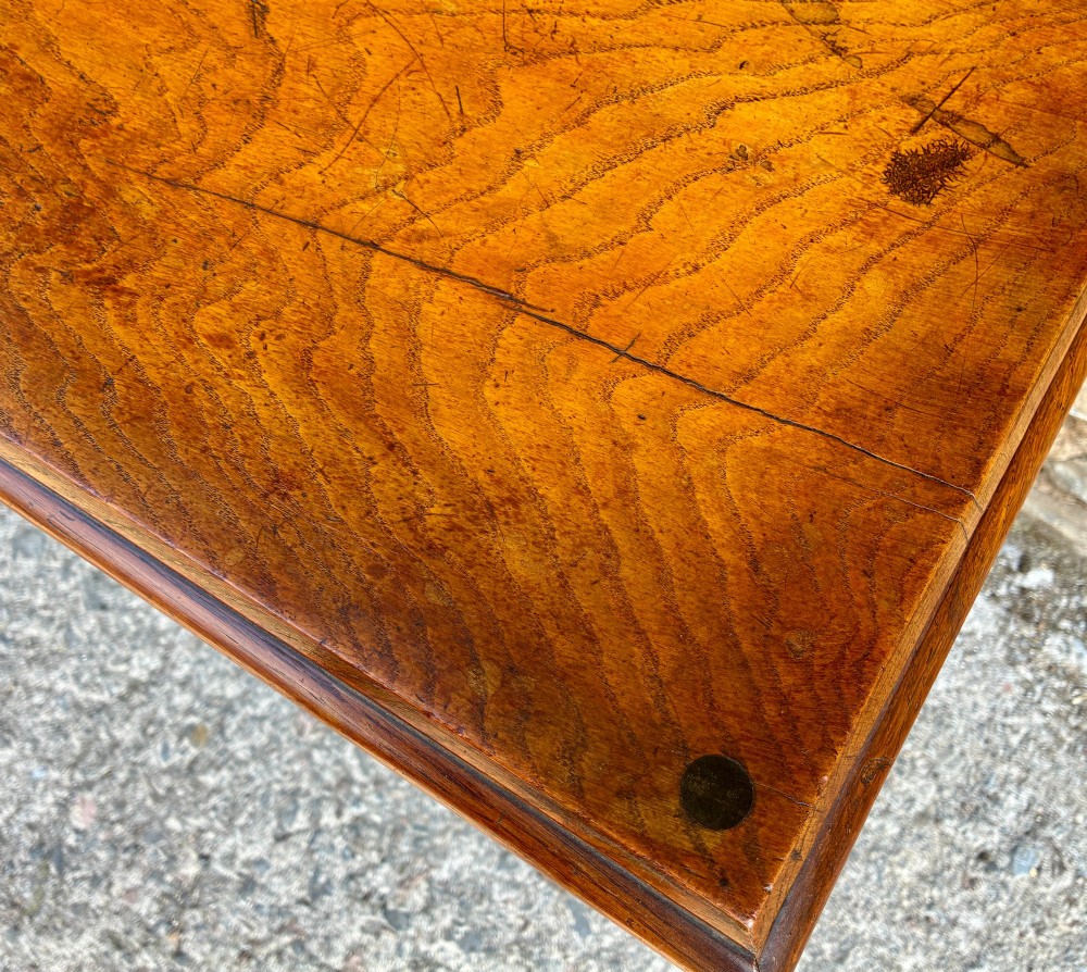 An Arts and Crafts solid oak side table featuring a lower shelf, straight square legs, and dark circular wood inlays arranged in a grid pattern on the top surface. View XIII