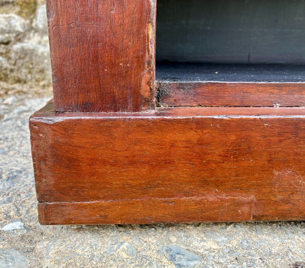 An antique Victorian open mahogany bookcase with four adjustable shelves and a dark painted interior. View IX