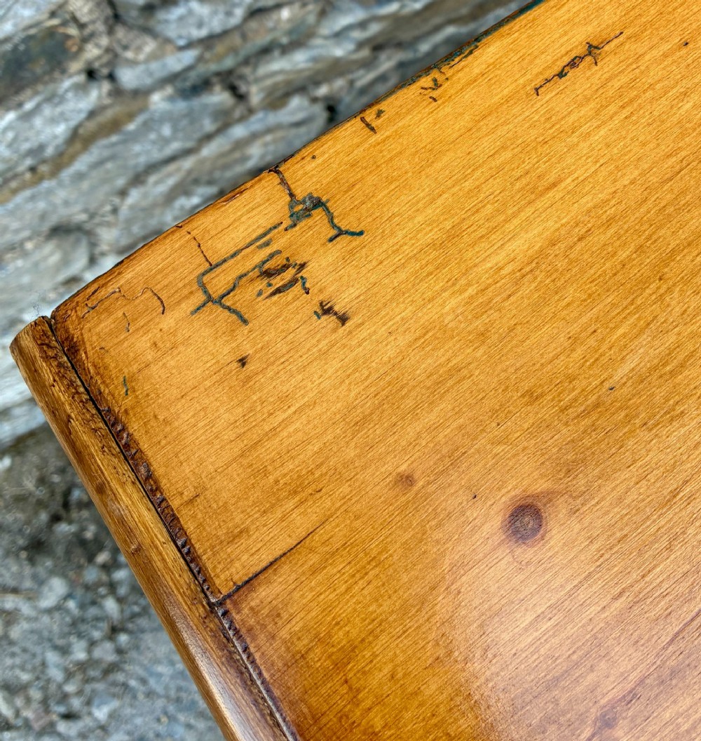 An antique warm pine chest of drawers featuring a two-over-three drawer arrangement with dark turned wooden knobs. View XII