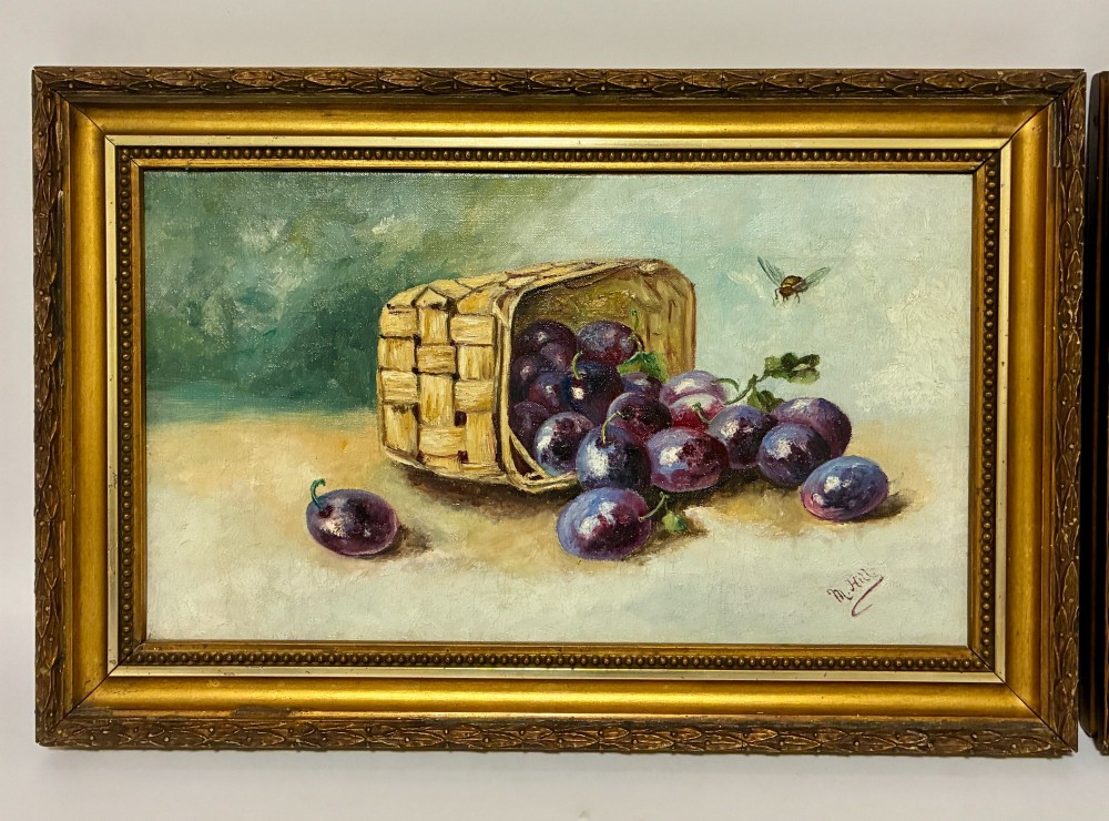 A pair of rectangular oil paintings depicting plums and cherries spilling from woven baskets in gilt wood frames. View III