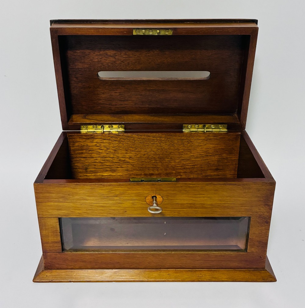 An antique mahogany tabletop letter box featuring a top posting slot, carved LETTERS plaque, key lock mechanism, and bevelled glass front panel. View III