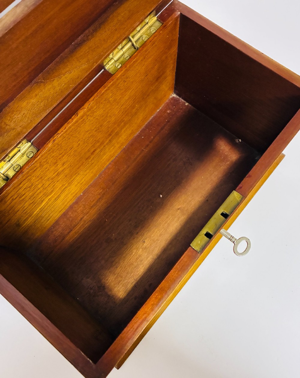 An antique mahogany tabletop letter box featuring a top posting slot, carved LETTERS plaque, key lock mechanism, and bevelled glass front panel. View V