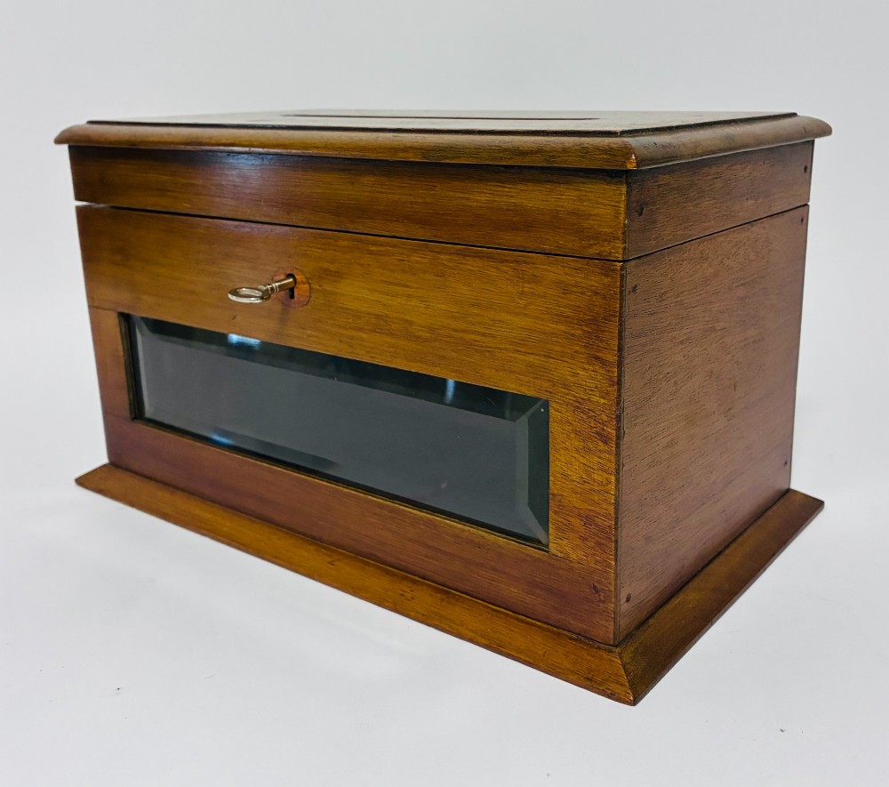 An antique mahogany tabletop letter box featuring a top posting slot, carved LETTERS plaque, key lock mechanism, and bevelled glass front panel. View VI